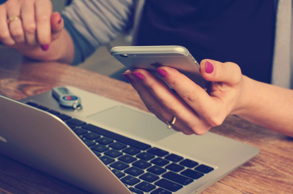 A person working and looking at their phone