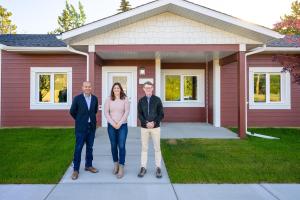 Left to Right: Minister Responsible for Yukon Housing Corporation Ranj Pillai, City of Whitehorse Deputy Mayor Michelle Friesen and Yukon Member of Parliament Brendan Hanley in front of one of the three new triplexes built in the Yukon. (2 Sycamore)