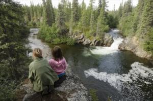 Kids overlooking Rancheria Falls, Yukon.