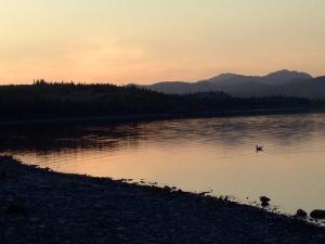 Beach sunset at Lake Laberge Campground, Yukon.